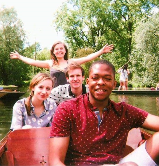 Four students punting on the river - Ashleigh Ainsley is at the front of the boat