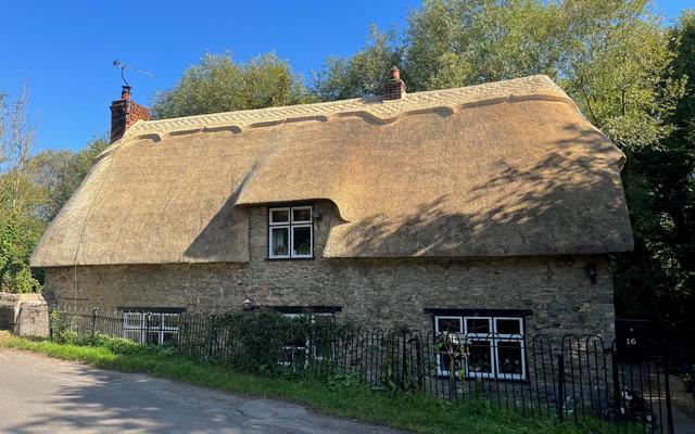 Cottage 16 in Wytham village, complete after being re-thatched