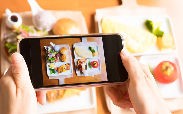 Trays of food seen through a smart phone lens