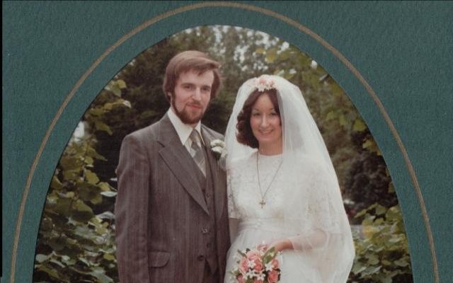 Nicky Bull (nee Harper) with her husband in their wedding photo