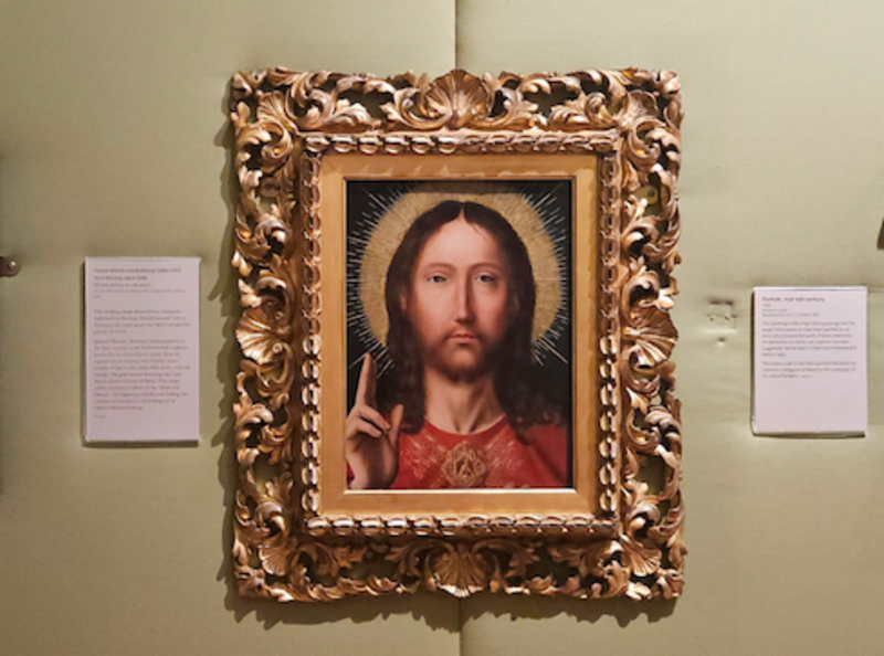 The painting 'Christ Blessing/Salvator Mundi' hanging at the Ashmolean Museum