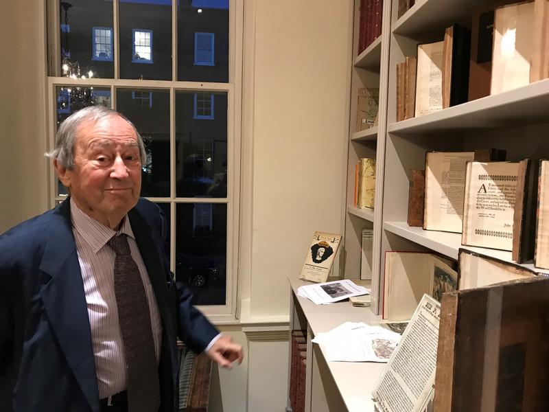 Sir Geoffrey Bindman, stood next to some of his books and prints