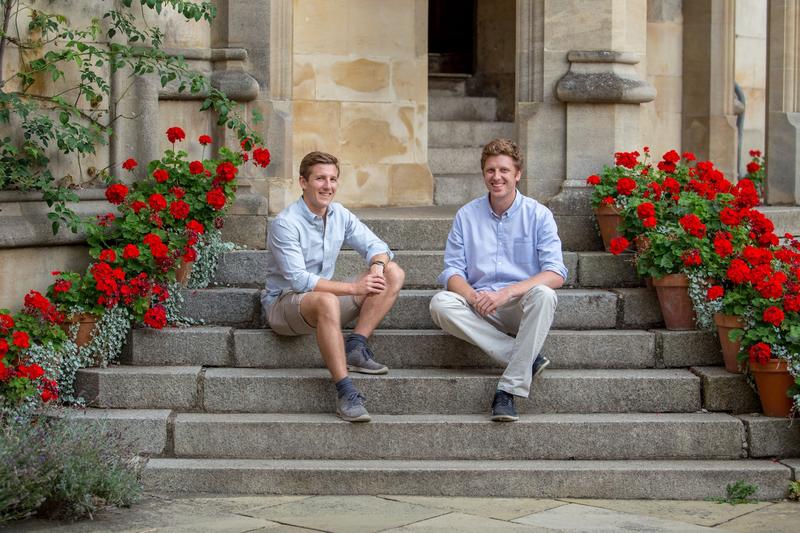 Harry Hortyn and Robert Phipps sat outside on a flight of steps