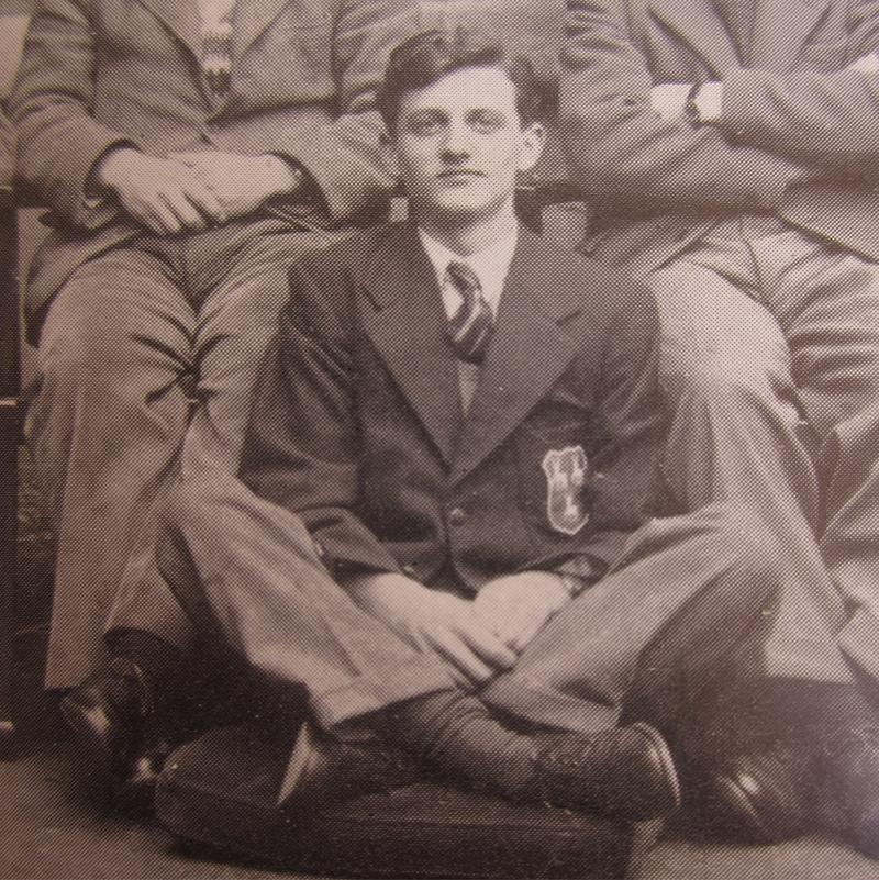 Sir John Houghton seated on the floor in a photograph of the Jesus College rowing squad