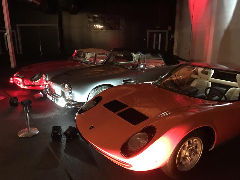  The E-Type, DB 4 and Miura on display indoors