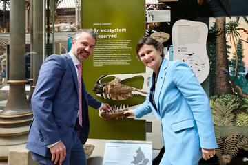 Dr Gavin Svenson and the Vice Chancellor Irene Tracey install a megalosaurus jaw bone