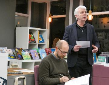 Professor Julian Allwood speaking, next to him seated is Professor Andrew Davison